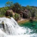 7 Camping Destinations with Spectacular Waterfalls