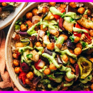 30-Minute Meal Prep Roasted Vegetable Bowls With Green Tahini in 2 plates
