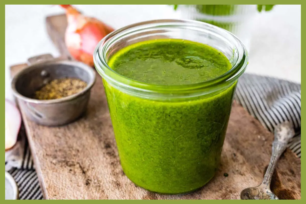 A picture of 5-Ingredient Cilantro Vinaigrette in a cup.