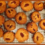 A picture of 5-Ingredient Peanut Butter Chocolate Chip Cookies on an oven grill sheet.