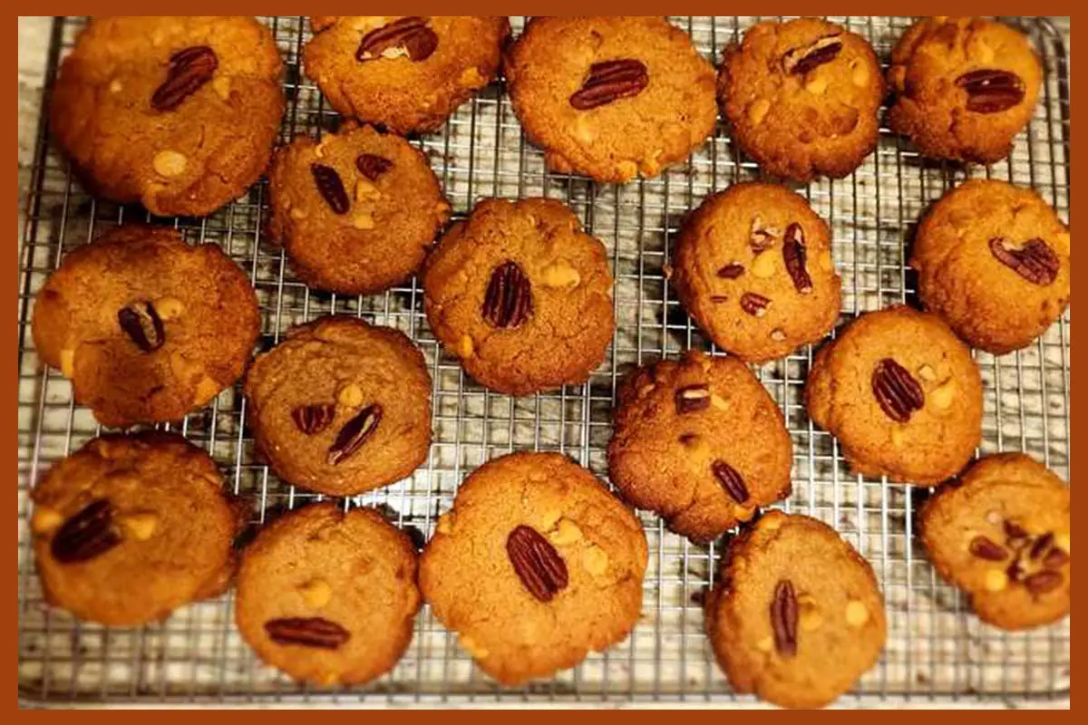 A picture of 5-Ingredient Peanut Butter Chocolate Chip Cookies on an oven grill sheet.