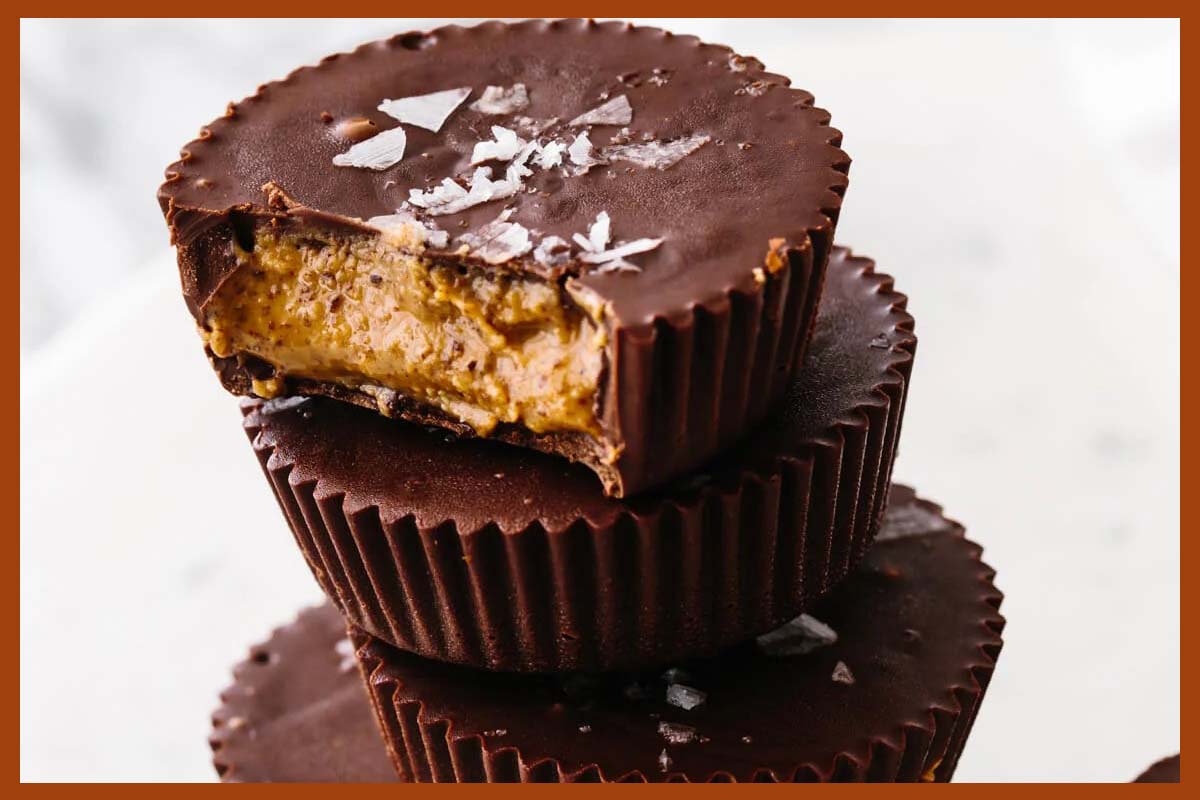 A picture of 3 Almond Butter Cups stacked on top of each other.