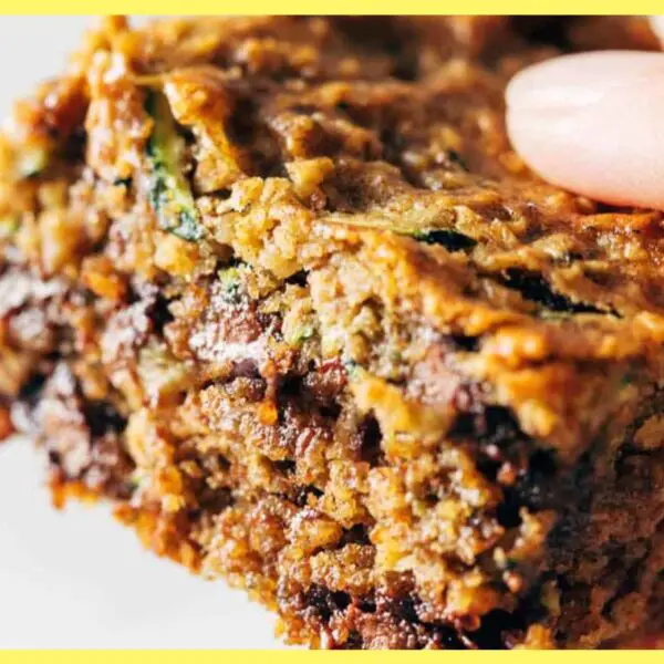 A picture of A person holding the delicious Almond Butter Chocolate Chip Zucchini Bars
