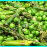 A picture of Asparagus And Pea Saute in a bowl. It looks very delicious.