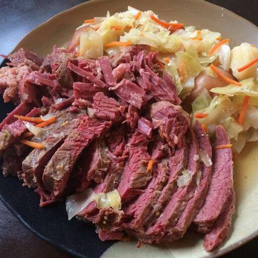 Crock Pot Corn Beef and Cabbage on a place