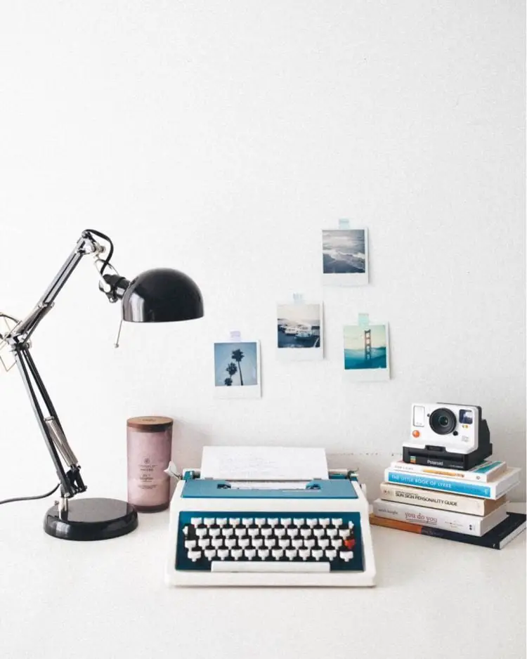 polaroid wall decor with typewriter