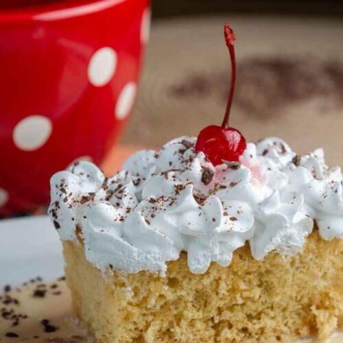 Tres leches Cake with a cherry on top