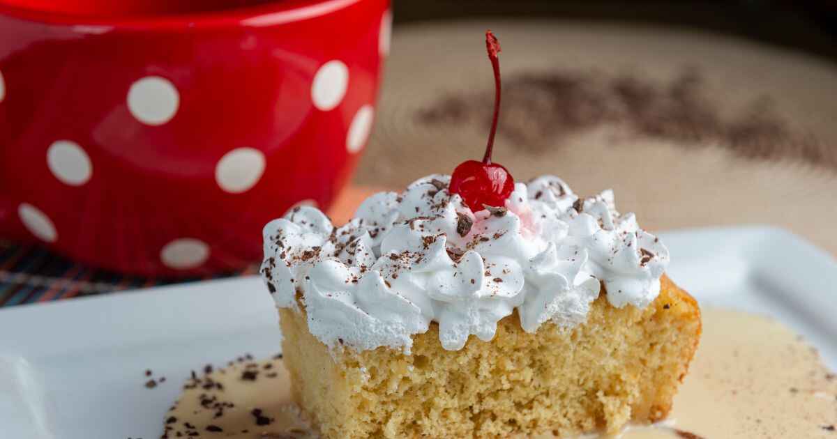 Tres leches Cake with a cherry on top