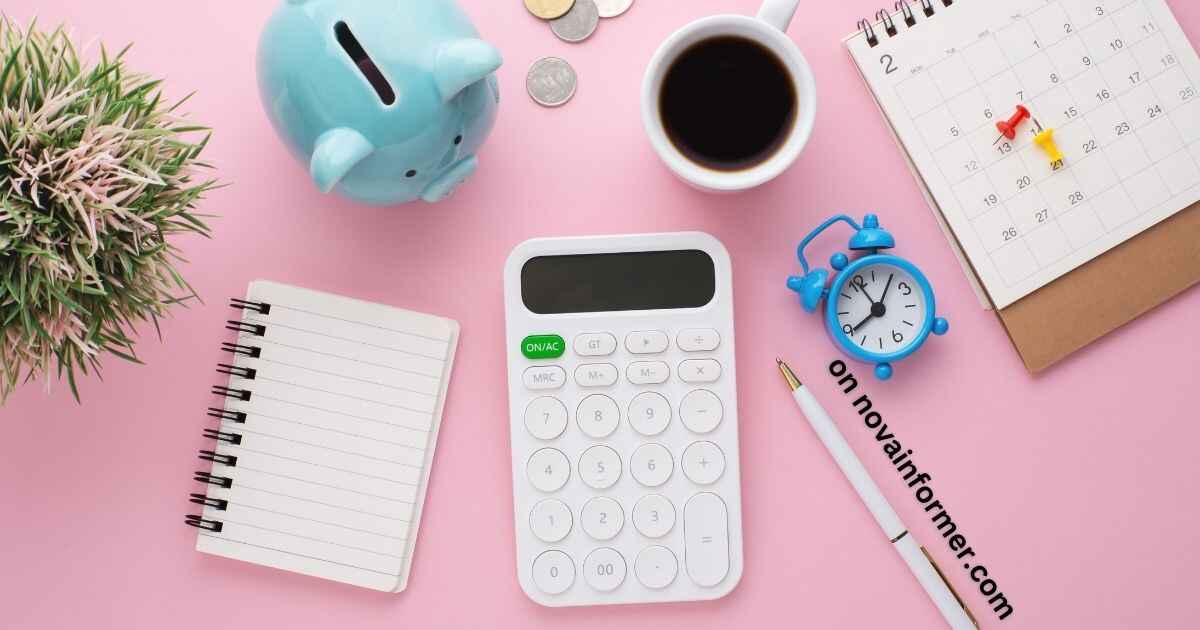 calculator, notepad, piggy bank, and a cup of coffee on a flat surface