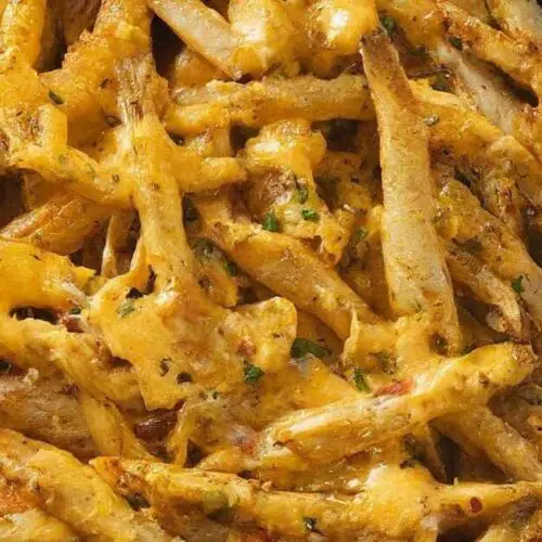 Baked Spicy Fries With Garlic Cheese Sauce