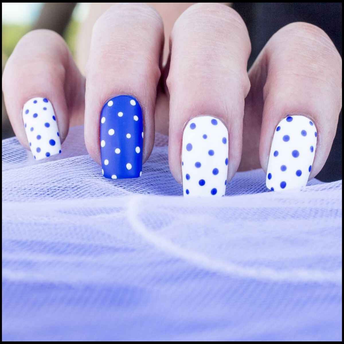 Blue and White Polka Dot Nail Design