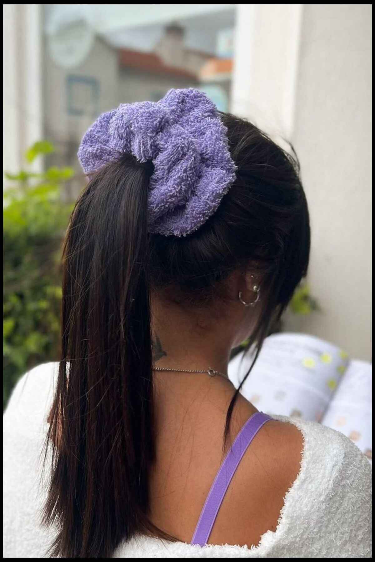 High Ponytail With A Scrunchie